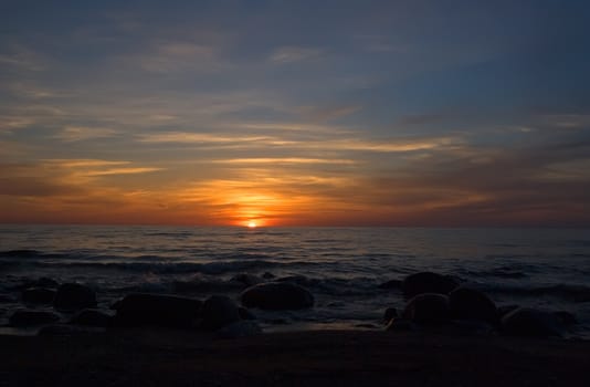 sea sunset baltic sun sky coast clouds