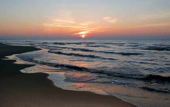 sea sunset baltic sun sky coast clouds