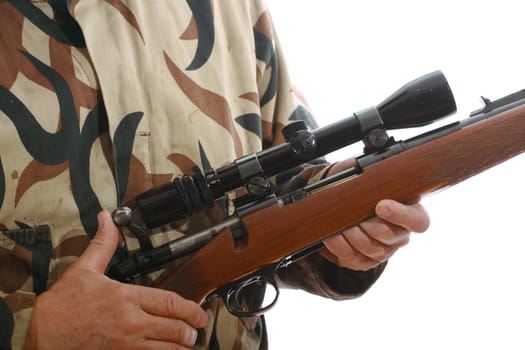Close-up of a hunters hands on his riffle