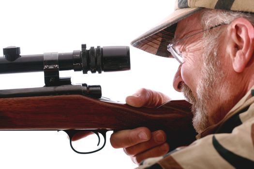 Hunter looking into the scope of his riffle