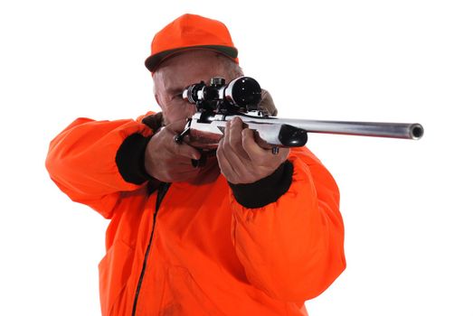 Hunter in Blaze gear with riffle