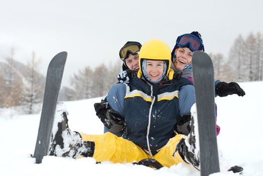 Group of happy, young skiers in the snow