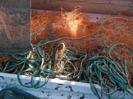 Details of colorful fishing nets on a trawler