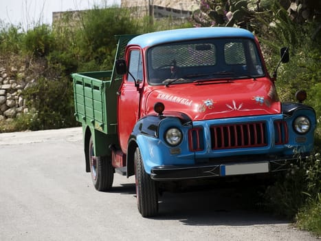 Old vintage rare truck painted in vivid colours in Malta