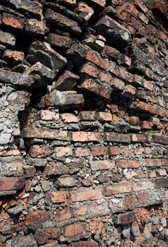 Ruined, old brick wall background