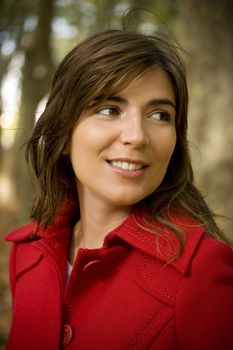 Closeup portrait of a beautiful happy woman in blur background