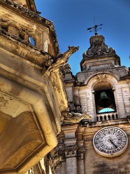 Medieval Gargoyle on a balcony in the city of Mdina in Malta