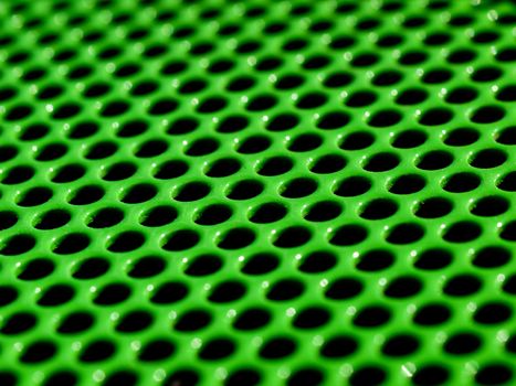 Macro picture of a green metallic grid