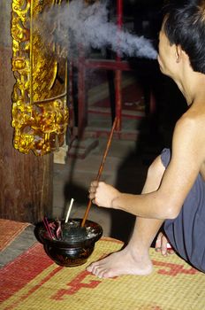 A water-pipe smoking in the special pagoda. The pagoda is a place of prayer, but also friendly. In some of the people engaged in maintenance services which live there year-round with even children.