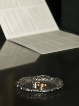 Beautiful wedding bands lying on a silver platter