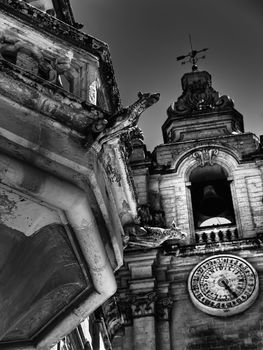 Medieval Gargoyle on a balcony in the city of Mdina in Malta