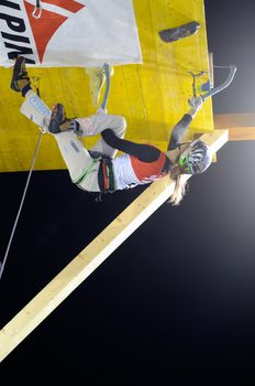 UNKEN, AUSTRIA - FEB 19: Ice climbing european cup finals. Lucie Hrozoca on her final run to win the competition on February 19, 2011 in Heutal, Unken in Austria.