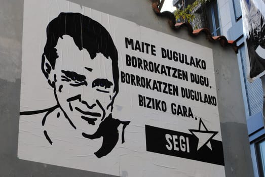 A poster commemorating diseased ETA member Jon Anza in city of Irun, Basque Country, Spain.