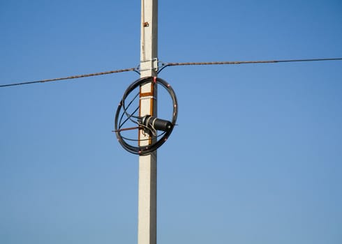 communication wires over blue sky Background