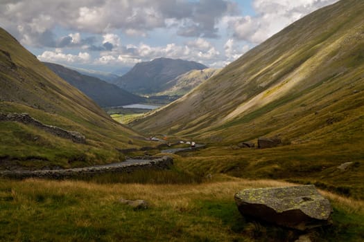 The Kirkstone Pass descends steeply towards Brothers Water in the Lake District in Cumbria, England. 