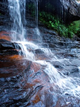 A tranquil waterfall in the Blue Mountains of New South Wales, Australia.