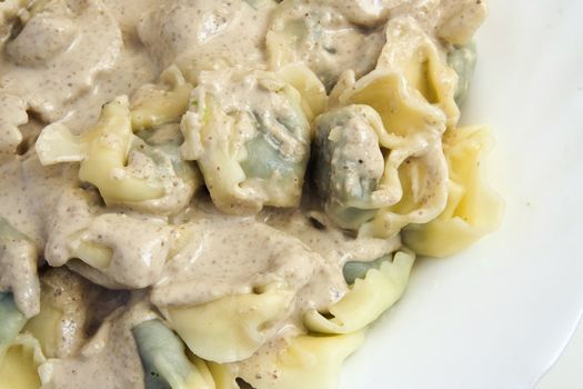 Typical dish of Ligurian cooking: paste stuffed like ravioli with walnut sauce