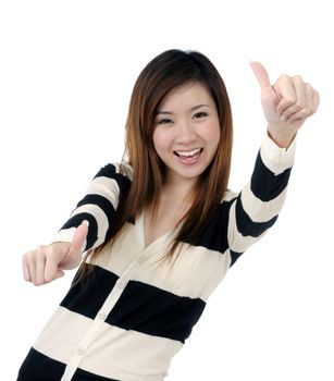 Portrait of a beautiful young woman giving thumbs up sign over white background.