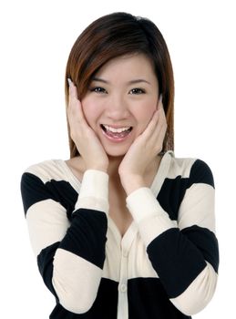 Portrait of a beautiful young woman looking surprised over white background.