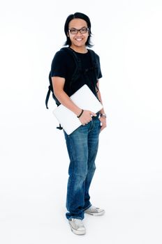 Portrait of a happy student carrying laptop and backpack over white background.