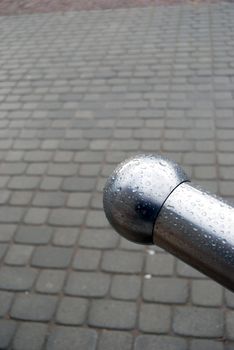 Urban abstraction with stair railing and sidewalk