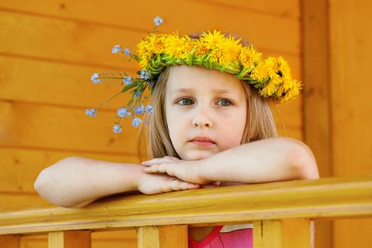 Little girl with very serious expression, as if on the verge of tears. 
