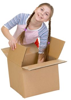 Girl thrust the hand into cardboard box on white