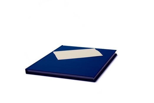 Blue notepad with blank sticker on white background