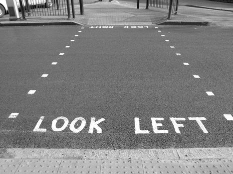 Look Left warning at a pedestrian zebra crossing in a London street