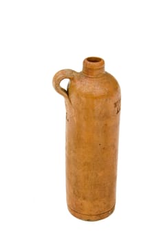 Old clay bottle with the tab isolated on a white background