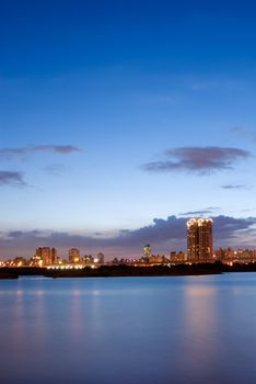 Here is city night scene with the river in Taiwan.