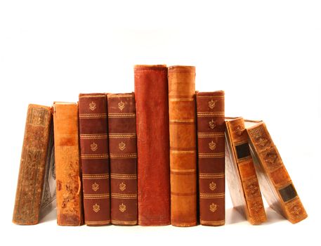 Old antique books against a white background