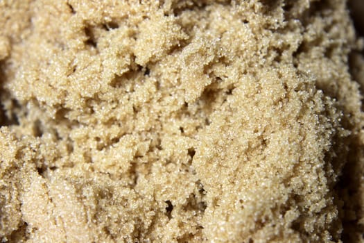 A close-up of brown sugar crystals.