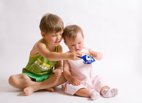 people series: affectionate brother and little sister play