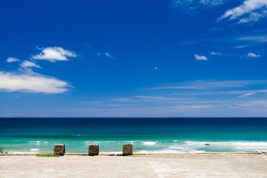 It is a dock with beautiful blue sky.