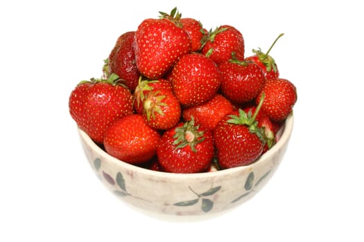 Fresh strawberries in a bowl isolated on white background