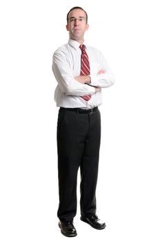 A young businessman standing with his arms crossed, isolated on a white background