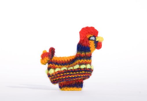 Cute Easter chick knitted from colored yarn