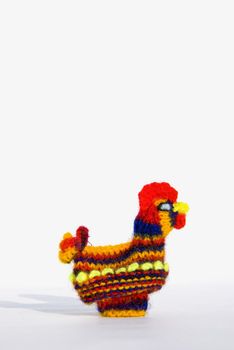 Cute Easter chick knitted from colored yarn