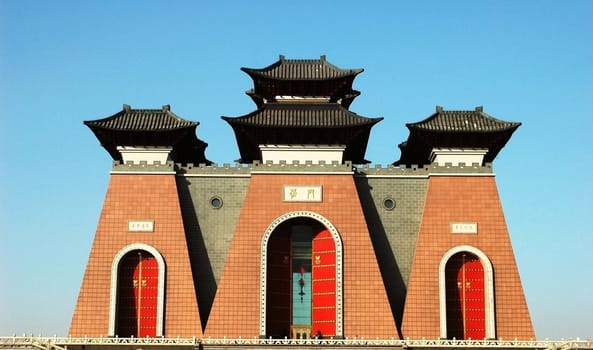 Landmark of traditional Chinese buildings with blue sky as background