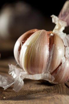 Garlic in closeup on wooden background