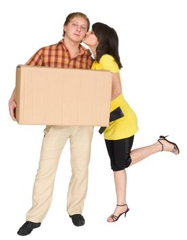 The girl kisses the guy holding a box