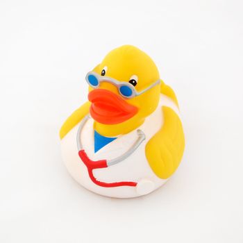 Rubber duck wearing doctor�s clothing isolated on a white background.