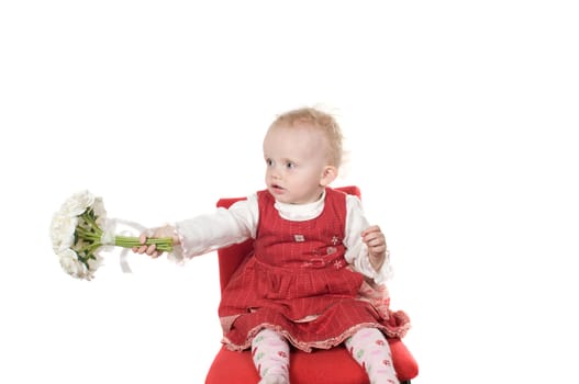 Closeup portrait of little girl sitting on the chair