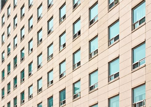 Apartment building with many windows at a university campus