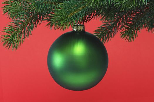 Decorative chrismas ball on red background