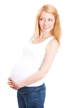 Pregnant woman standing on isolated white holding her belly