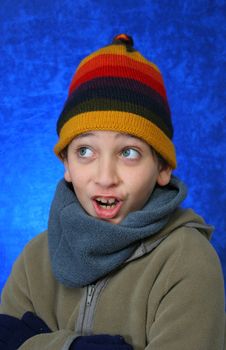 Boy doing fun expression  in winter outfit. Look at my gallery for more winter images
