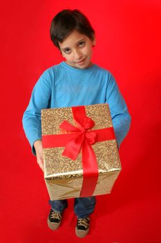 Cute boy with a christmas gift