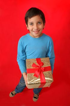 Cute boy with a christmas gift